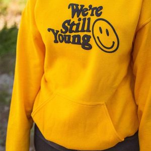 fanjoy-merch-fanjoy-we-re-still-young-gold-hoodie-hoodie-28319090901101.jpg